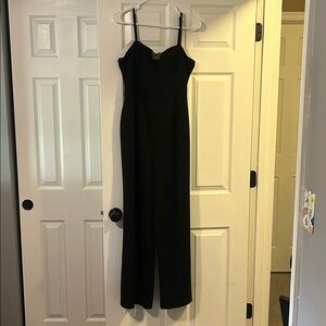 Elegant Black Jumpsuit with mesh v neck.